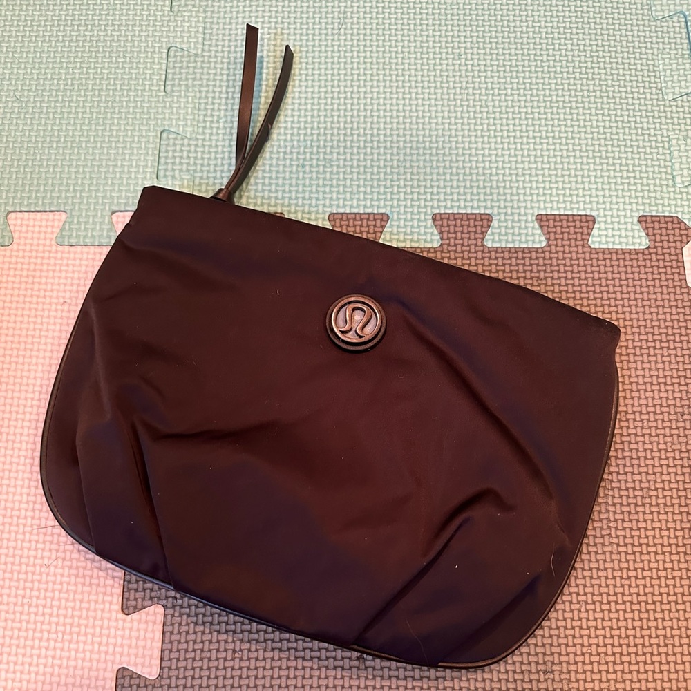 Black Lululemon pouch - unused from a backpack interior but can be its own bag